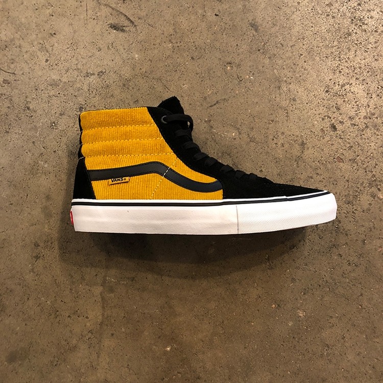 yellow and black vans high tops